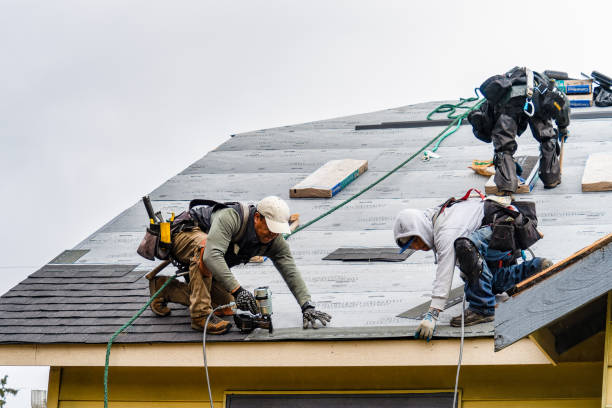 Professional Gutter Installation technician working in Marietta, OK